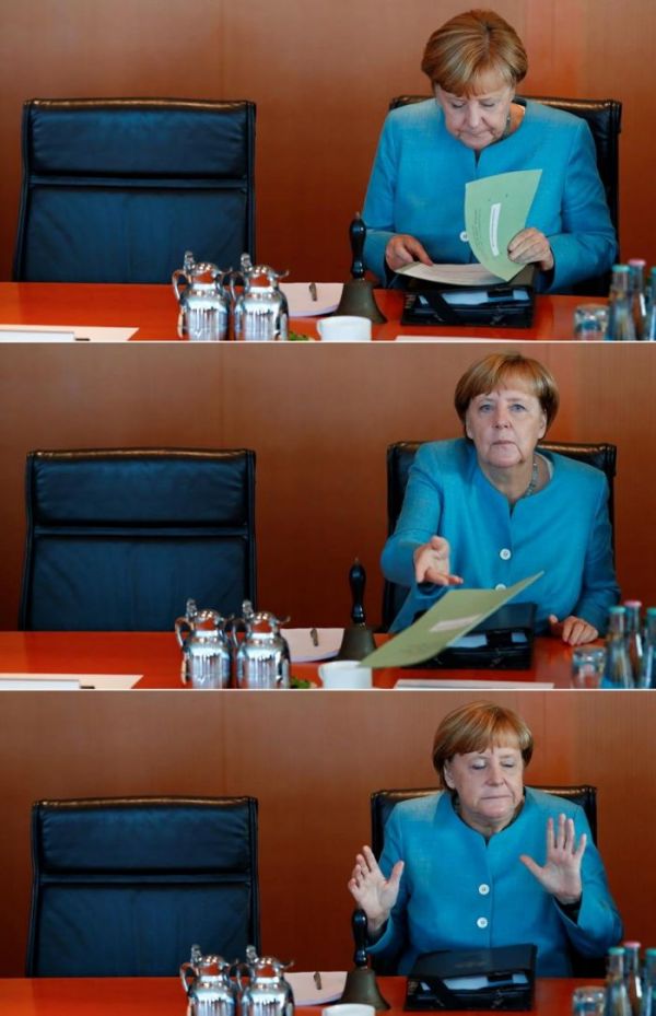 Merkel kabinet toplantısında yaxalandı - FOTO