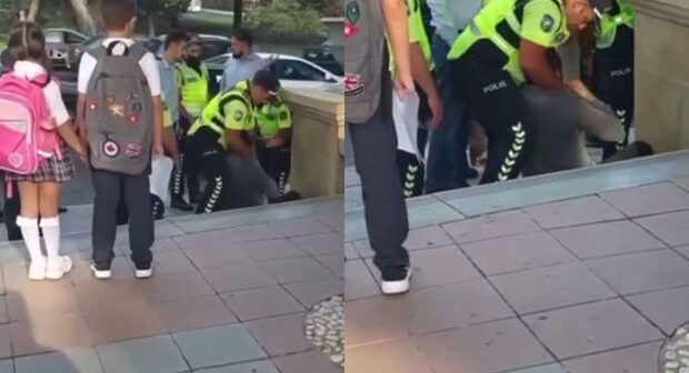 Bakıda şagirdlərin gözləri qarşısında yol polisi vətəndaşa hücum edib – VİDEO