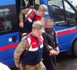 13 polisi öldürən terrorçu qadın paltarında tutuldu