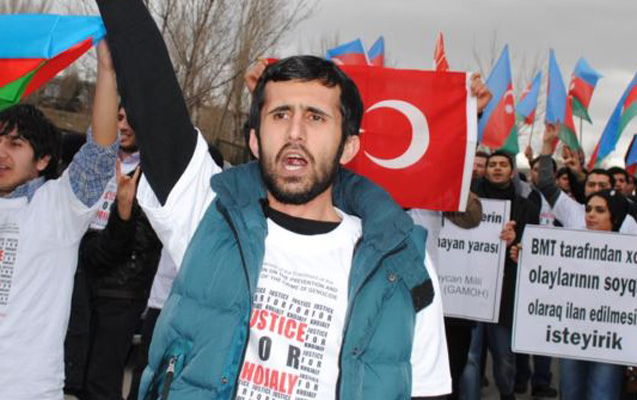 HRW Elgiz Qəhrəmanı buraxmağa çağırır